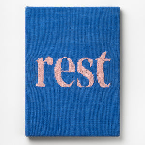 Kate Just, Rest, 2023, from Self Care Action Series, hand knitted acrylic yarn, canvas, and timber, 55 x 40 cm 