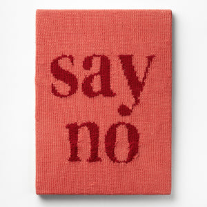 Kate Just, Say No, 2023, from Self Care Action Series, hand knitted acrylic yarn, canvas, and timber, 55 x 40 cm 