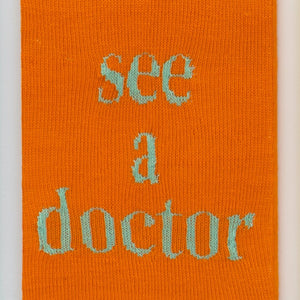 Kate Just, See a Doctor, 2022, acrylic yarn, timber and canvas, 55 x 40 cm. Photography by Simon Strong