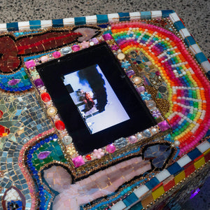 Paul Yore, SUCH IS LIFE (detail), 2023, mixed media assemblage comprising found objects, glass, jewellery, beads, buttons, enamel, wood, epoxy resin, LED, screen and video, 52 × 63 × 230 cm
