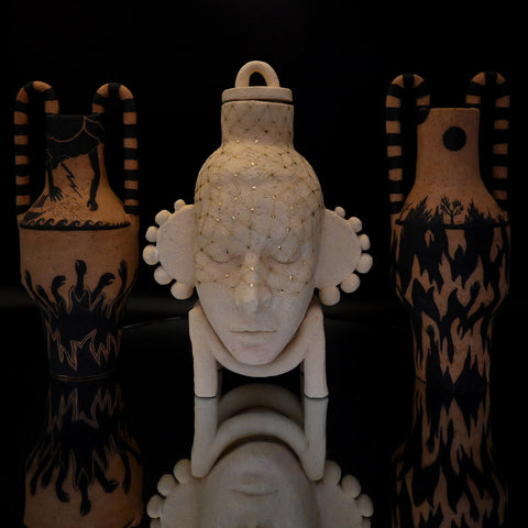 Fiona Roberts, Fury and Wrath (Storm, Drought and Flood), 2024, stoneware with underglaze, 28 x 11.5 x 11 cm;Fiona Roberts, Janus (Mourning Veil), 2024, stoneware, glaze, gold lustre, 30 x 21.5 x 18.5 cm; Fiona Roberts, Fury and Wrath (Eruption and Fire), 2024, stoneware with underglaze, 29 x 11.5 x 11 cm