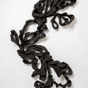 Sam Gold, Arching over and bending towards the light, 2022, black stoneware (wall mounted), 136 x 78 x 5 cm