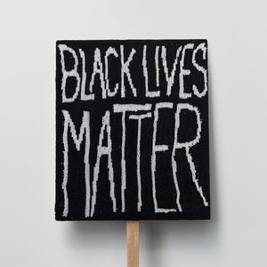 Kate Just, Black Lives Matter, 2022, knitted wool as placard with plywood stand, 50 x 60 cm