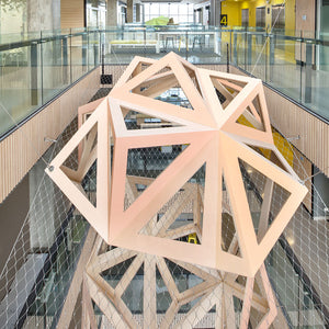 Amy Joy Watson, Celestial Bodies, permanent installation, Daniel Mannix Building, Australian Catholic University, Melbourne, 2015, plywood, acrylic paint, coloured rope, stainless steel cables