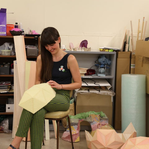 Portrait of Amy Joy Watson in her studio. Photo by Nici Cumpston