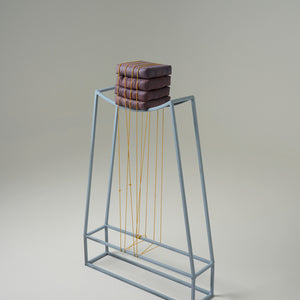 Anna Horne, What Does Purple Feel Like?, 2023, concrete, steel frame and rope, 125 x 80 x 23 cm. Photography by Sam Roberts
