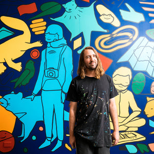 David Booth [Ghostpatrol] with mural for ‘Divided Worlds’ at the Art Gallery of South Australia, 2018