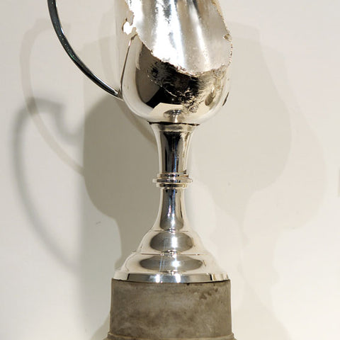 Elvis Richardson, The impossibility of losing in the mind of someone winning, 2008, cast concrete, found trophies burnt and resilvered, dimensions variable