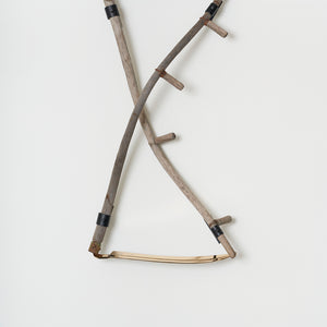  Julia Robinson, An Old Dance of Blood and Death, 2022, scythes, gold plated blade, steel, fixings, 110 x 80 x 25 cm irreg