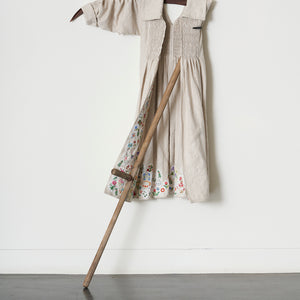  Julia Robinson, Tatterdemalion, 2022, linen, thread, found embroidery, scythe, steel, 155 x 75 x 30 cm irreg.