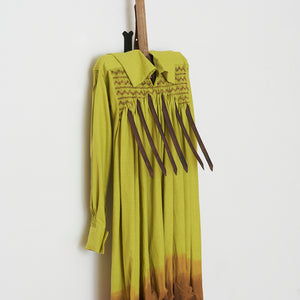 Julia Robinson, The Raker of Mud, 2022, linen, thread, rake, steel, fixings, 150 x 50 x 35 cm