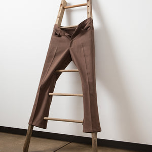 Julia Robinson, Untitled, 2013, trousers, timber, thread, dimensions variable