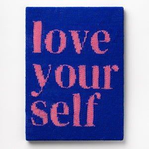  Kate Just, Love Your Self, 2022, acrylic yarn, timber and canvas, 55 x 40 cm. Photography by Simon Strong