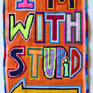 Paul Yore, I’m With Stupid, 2016, wool needlepoint, 48 x 29 cm irreg