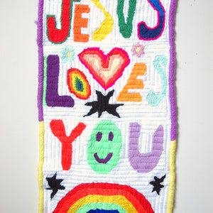 Paul Yore, Jesus Loves You, 2018, wool needlepoint, 50 x 25 cm irreg