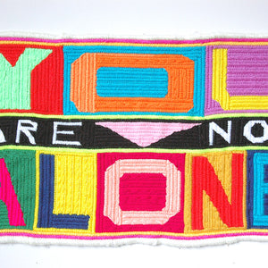 Paul Yore, You Are Not Alone, 2017, wool needlepoint, 50 x 28 cm irreg