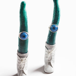 Pip Ryan, Cuke Walkers, 2020, resin, doll boots, baby socks, antique porcelain eyes, 29 x 13 x 8 cm