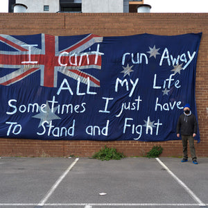   Richard Lewer, I can’t run away all my life sometimes I just have to stand and fight, 2020, acrylic on found flag, 360 x 730 cm