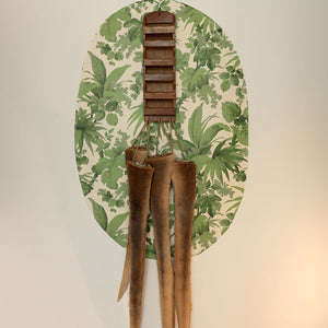 Sera Waters, 2014, Stumped: A family gathering, Four kangaroo tails, beads, cotton, linen and stuffing + found bill holder and wallpaper, variable dimensions